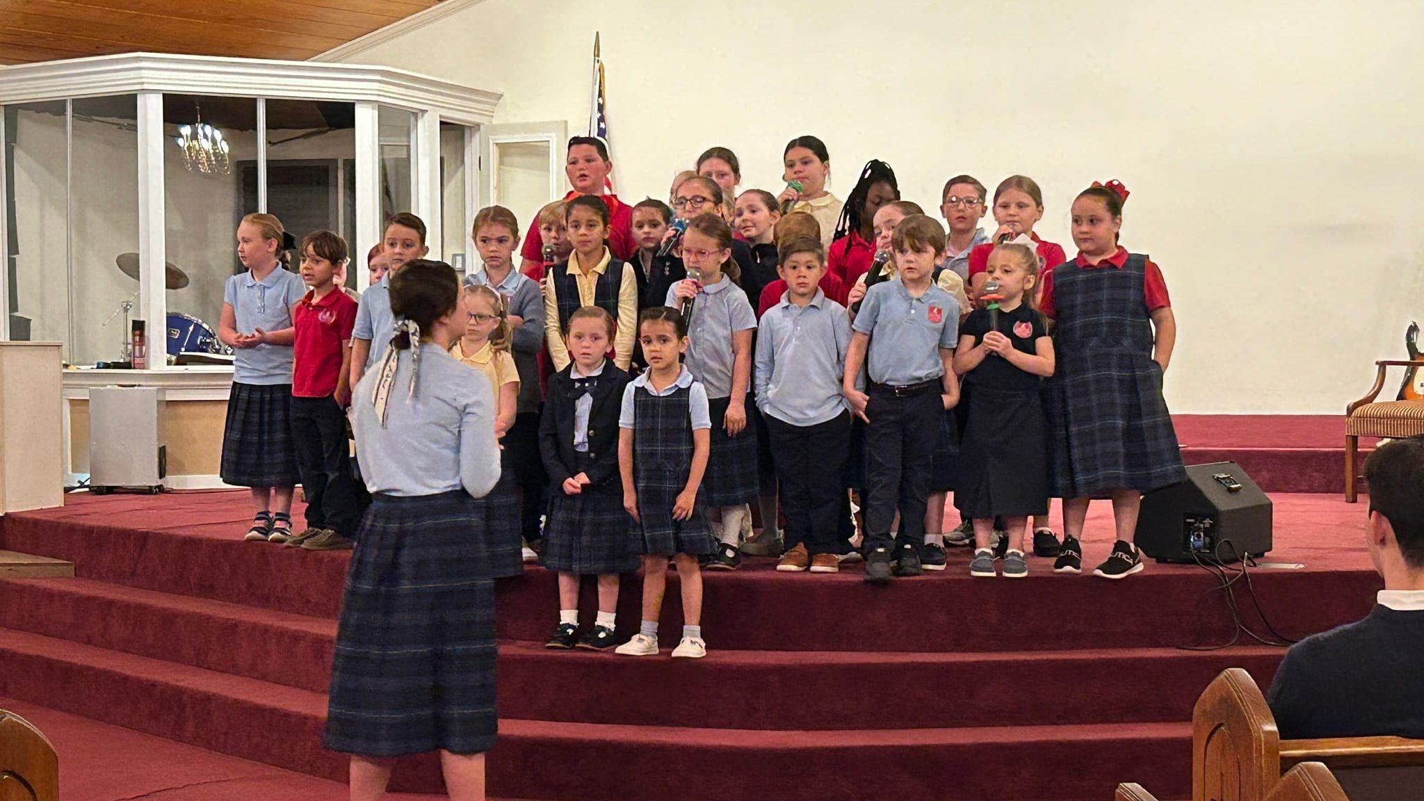 Carthage Christian Academy students singing at a chapel program
